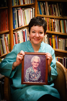 Libby with a picture of her great-aunt, Lobo